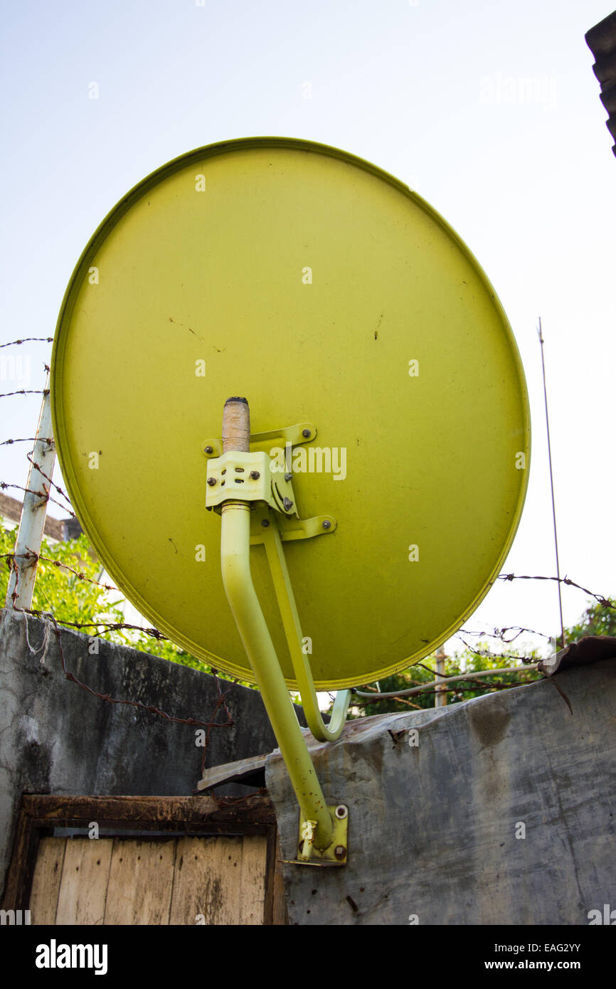 yellow satellite disc - back view Stock Photo - Alamy