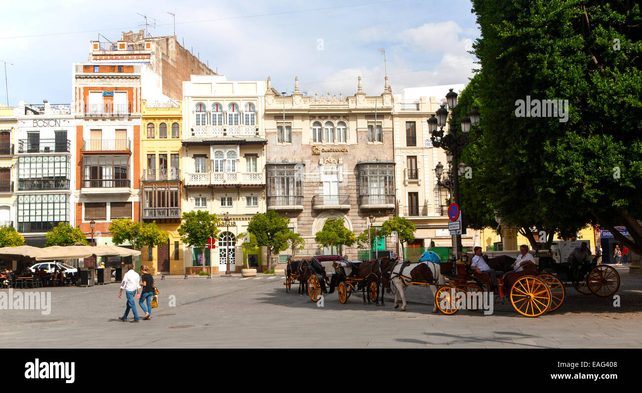 Shops and housing in historic buildings, Plaza de San Francisco, Seville, Spain Stock Photo