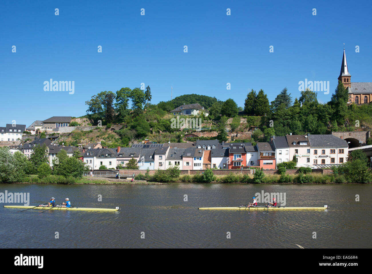 Saar River with two sculling boats Saarburg Saarland Germany Stock Photo