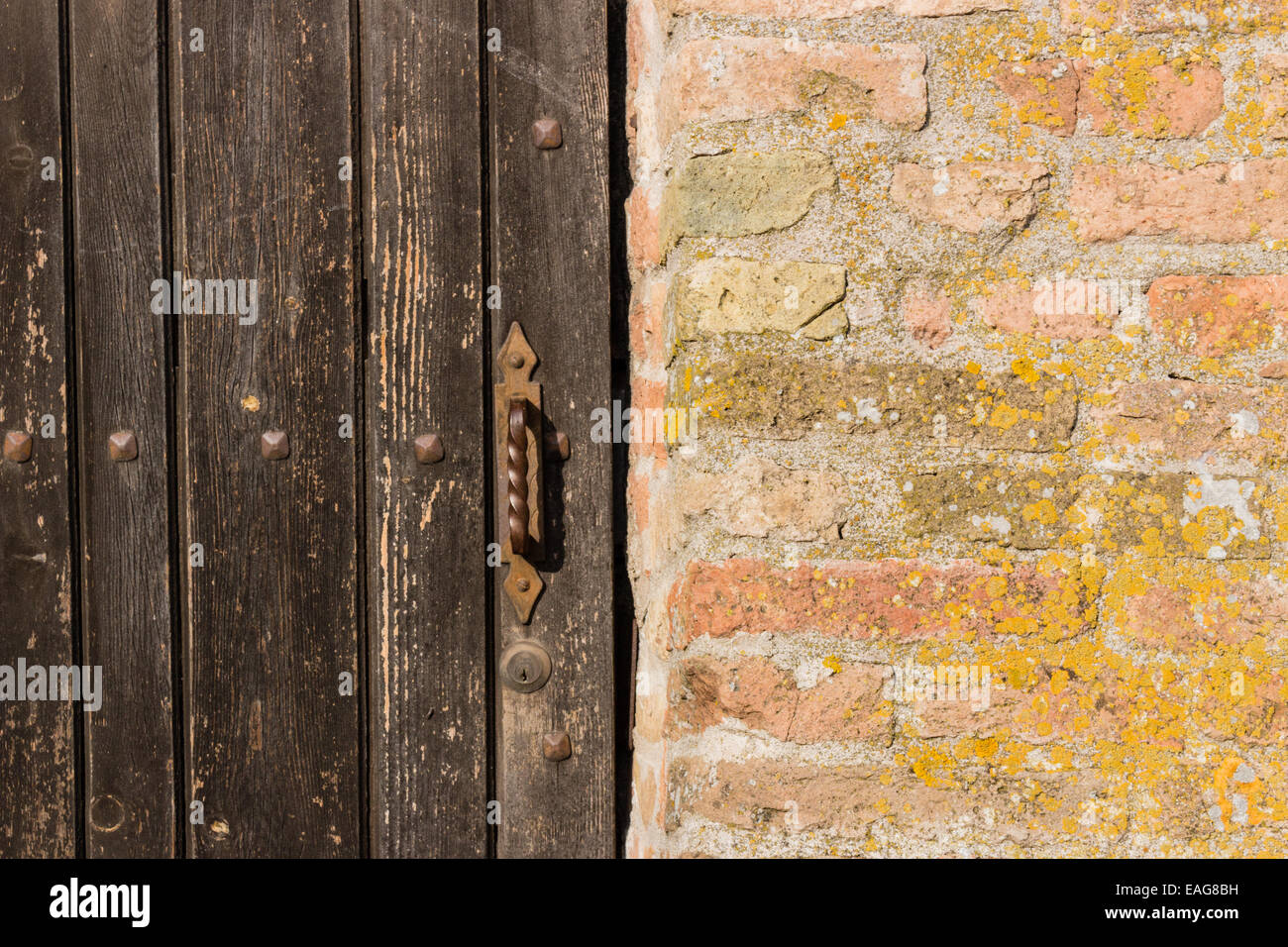Door in the brick walls of the medieval Fortress of Venetians in Brisighella Stock Photo