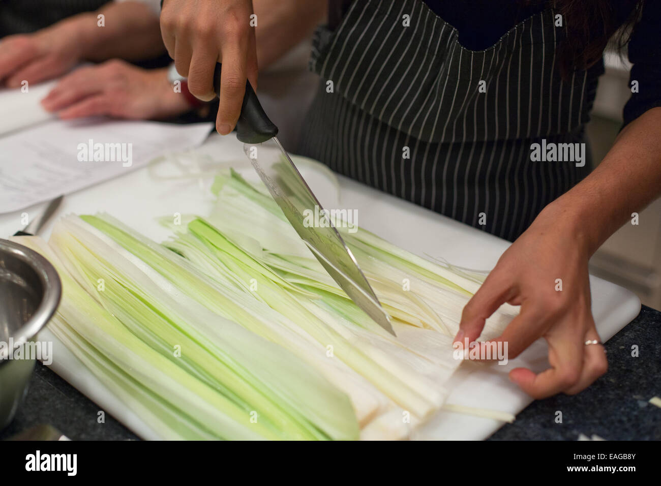 Julienne cutting fennel with a chef knife Stock Photo Alamy