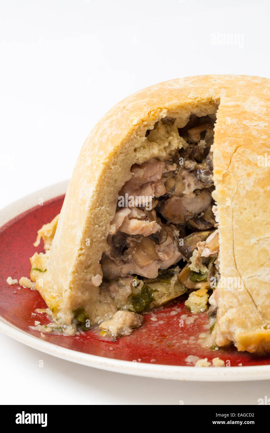 Chicken and mushroom suet pudding, steamed in a a basin, and old