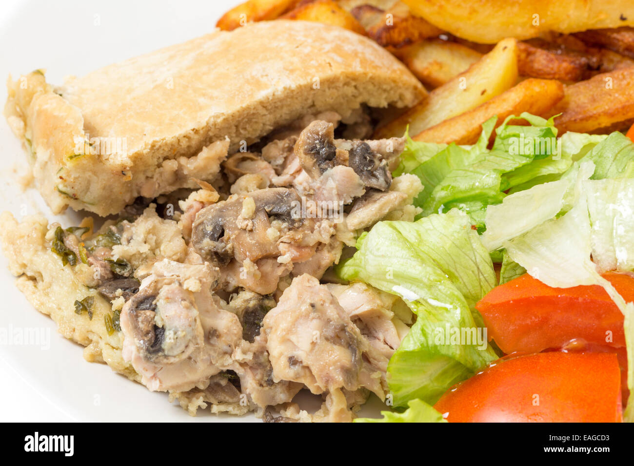 Chicken and mushroom suet pudding, steamed in a a basin, and old