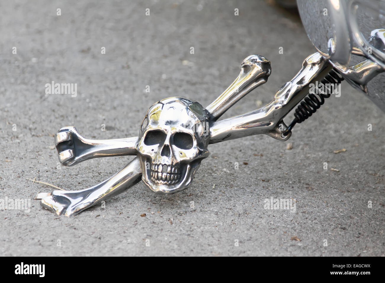 shiny prop-stand of motor bike, skull and bones prop-stand Stock Photo