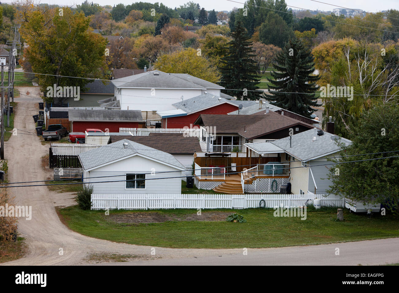 alleyway at the back of suburban canadian homes Saskatchewan Canada