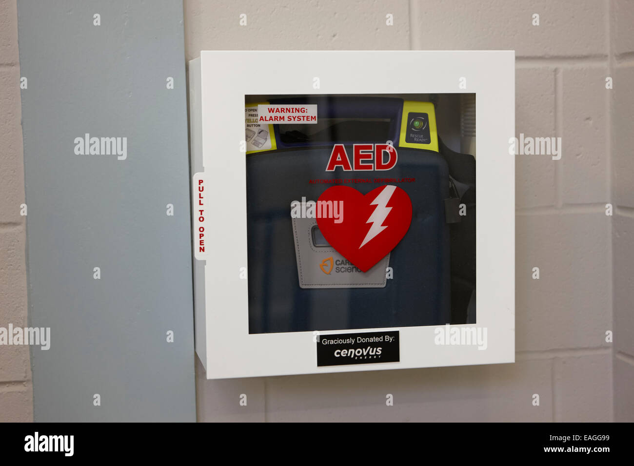 aed automated external defibrillator installed in a high school public place Saskatchewan Canada Stock Photo
