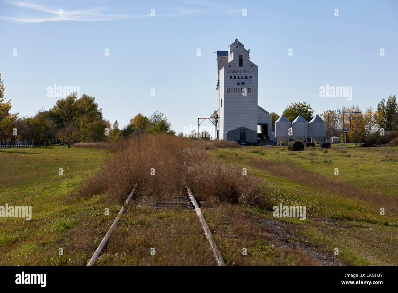grain elevator and old train track landmark bengough Saskatchewan Canada Stock Photo
