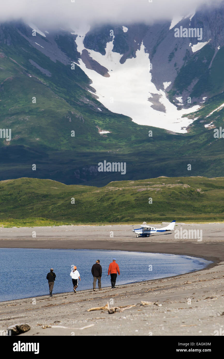Visitors On Beach In Cape Douglas, Katmai National Park, Alaska Peninsula, Southwest Alaska, Summer. Stock Photo
