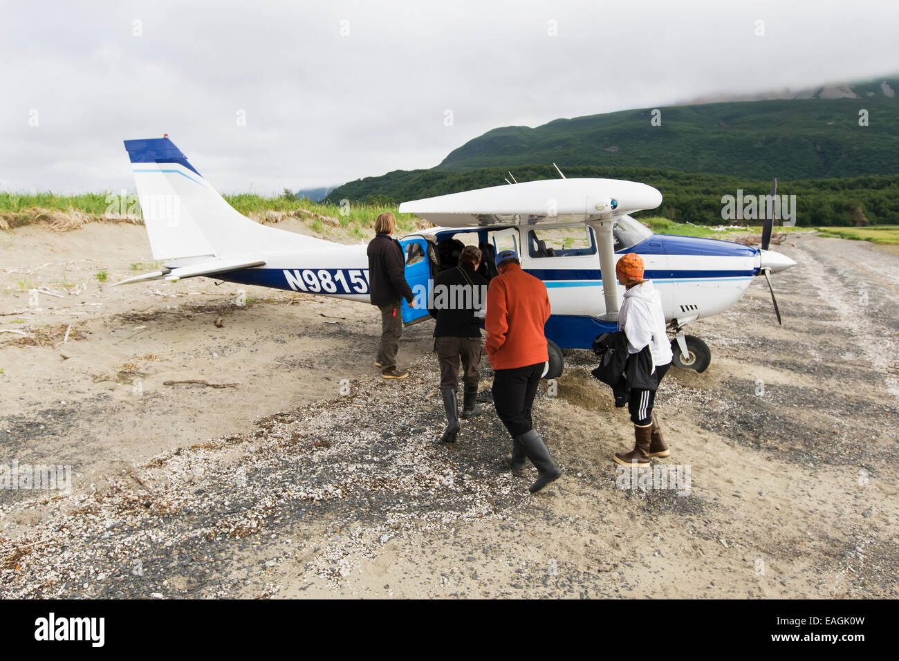 Visitors Boarding Cessna In Hallo Bay, Katmai National Park, Alaska Peninsula, Southwest Alaska, Summer. Stock Photo