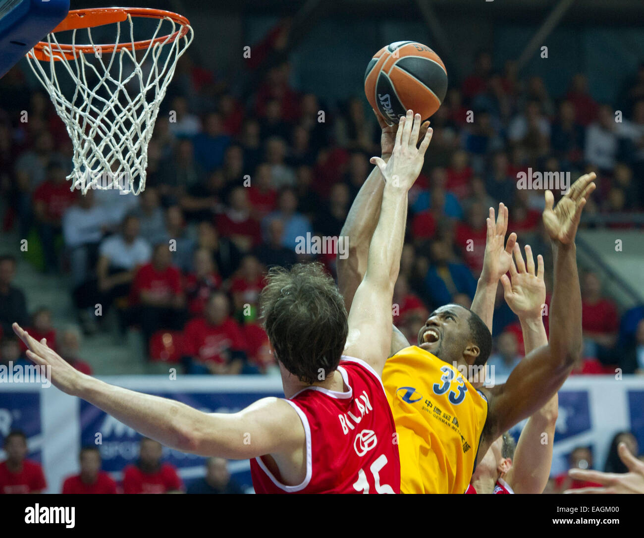 Zagreb, Croatia. 14th Nov, 2014. Jamel McLean of Alba Berlin (R) vies with Miro Bilan of Cedevita Zagreb during a Euroleague basketball match at Drazen Petrovic Basketball Center in Zagreb, Croatia, Nov. 14, 2014. Alba Berlin won 80-67. © Miso Lisanin/Xinhua/Alamy Live News Stock Photo