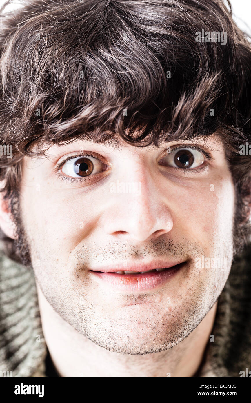 close-up portrait of a young casual guy, maybe a student, smiling Stock Photo