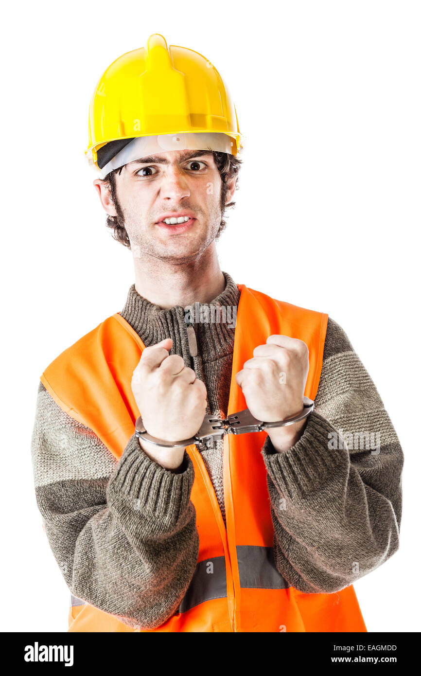 an engineer or a foreman wearing hard hat and reflective vest arrested with handcuffs isolated on white Stock Photo