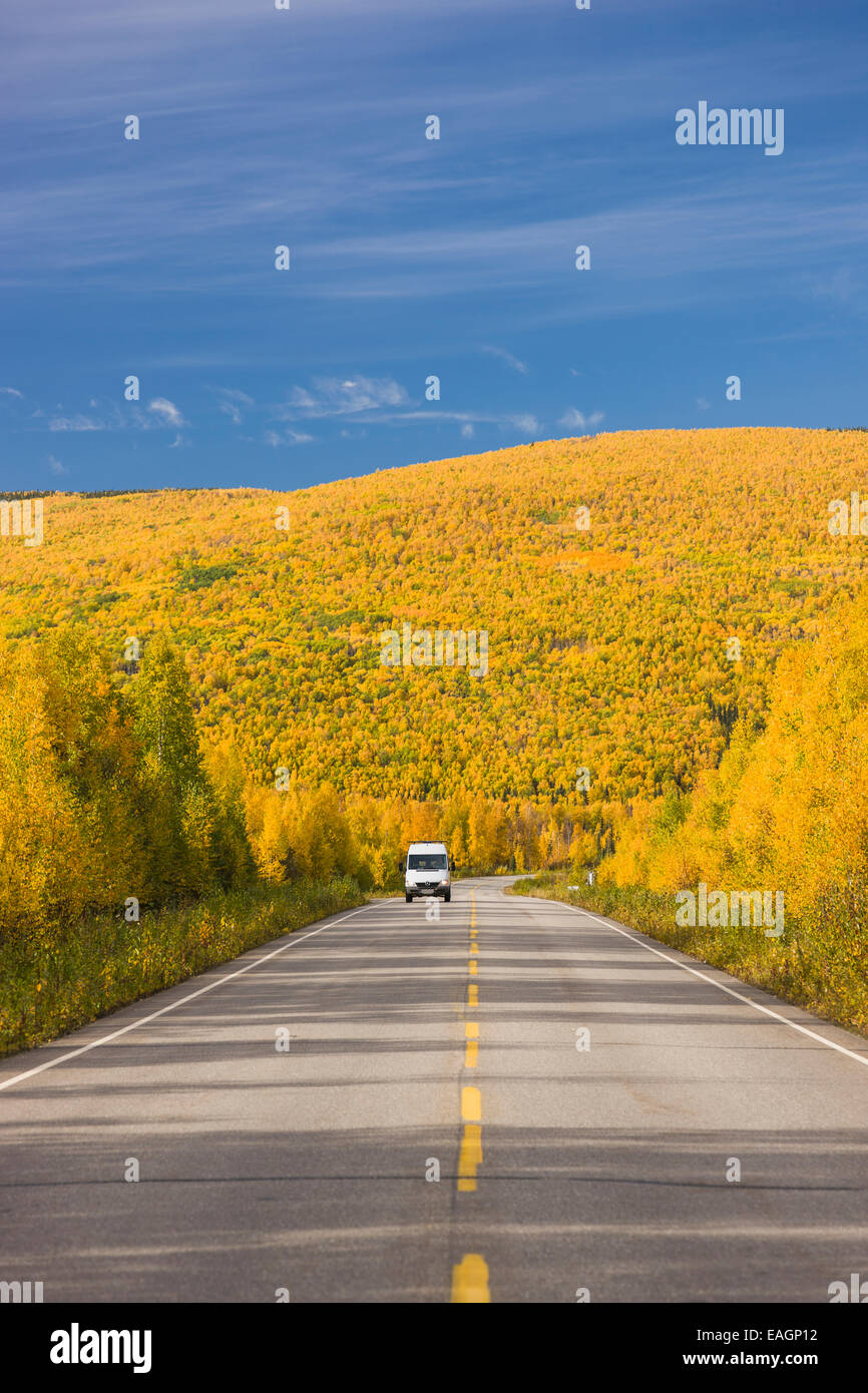 White Camper Van Traveling The Steese Highway North Of Fairbanks On A