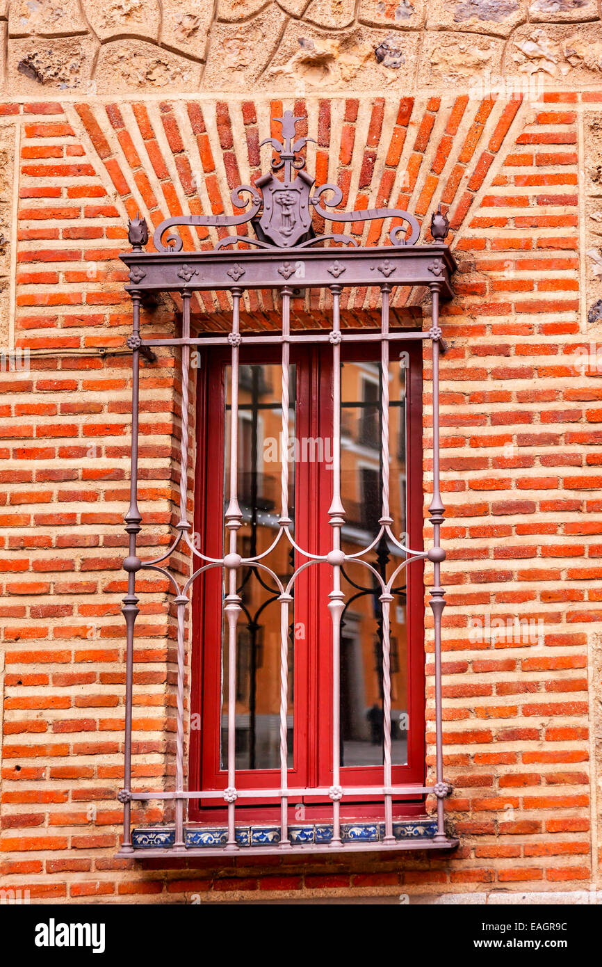 Window Bars Reflection Casa de Cisneros Plaza de la Villa, Madrid Spain. Former Town Hall of Madrid Stock Photo