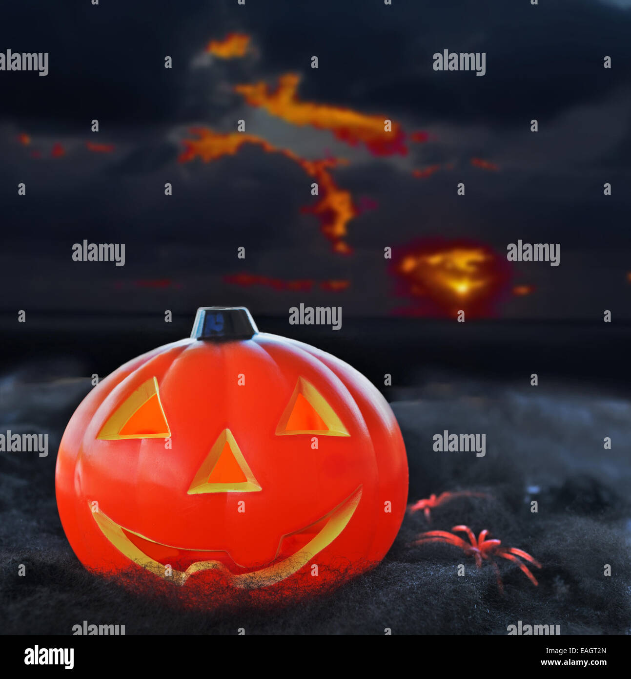halloween pumpkin under a dramatic sky Stock Photo
