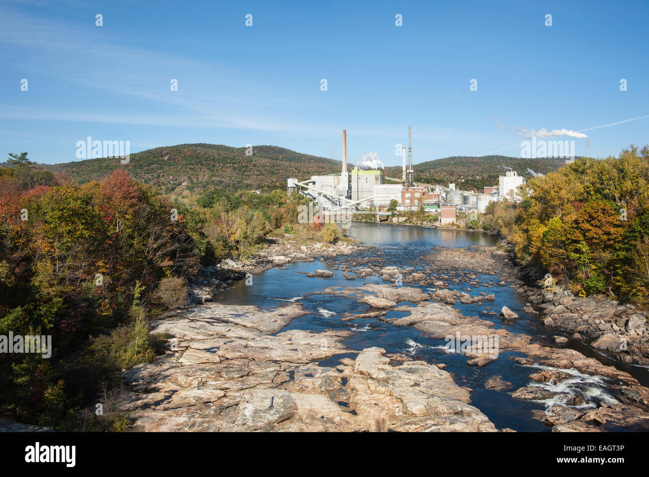 Swift River flowing through Rumford, Maine, with paper mill background