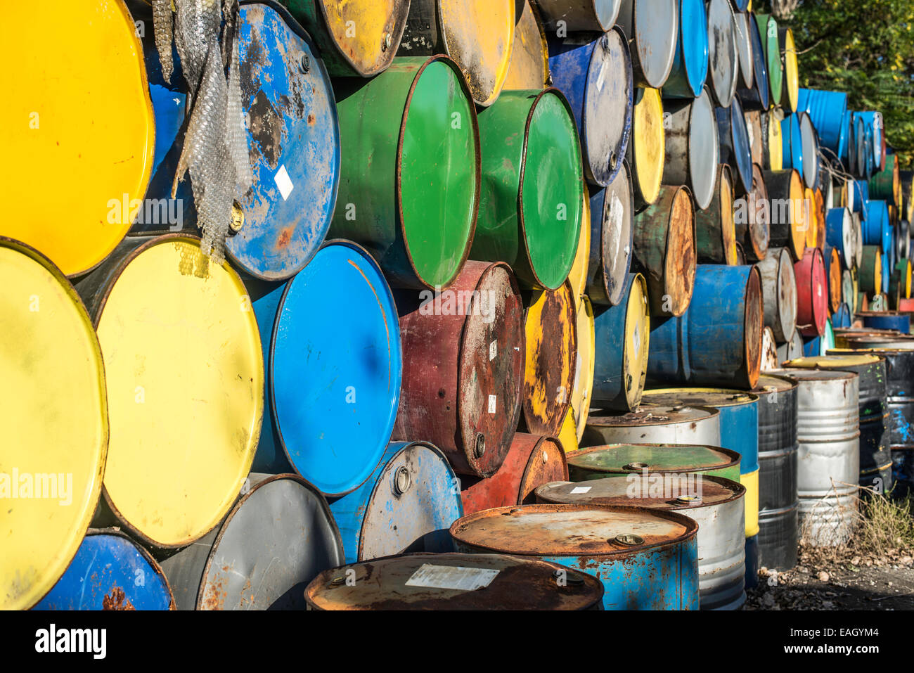 Barrels of oil. Pile of multicolor barrels Stock Photo
