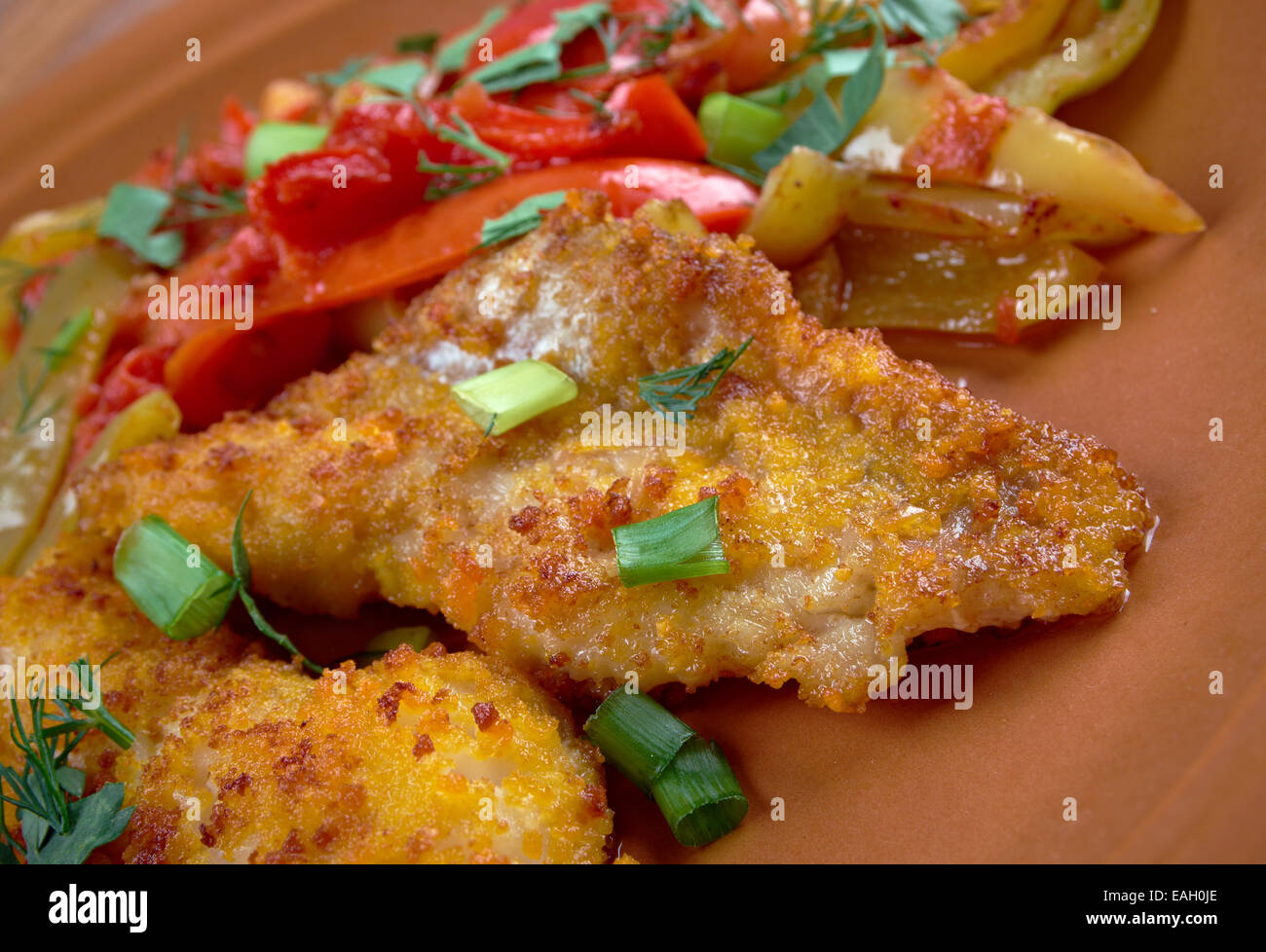 Filetto di rombo con verdurine - Italian  fried flounder with vegetable Stock Photo