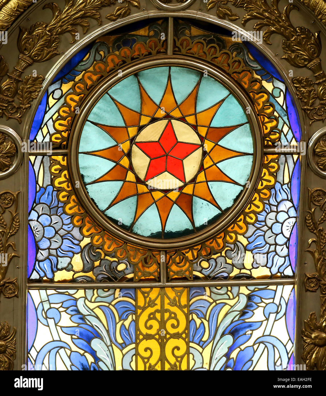 beautiful stained glass is photographed close up in the Moscow metro station Novoslobodskaya Stock Photo