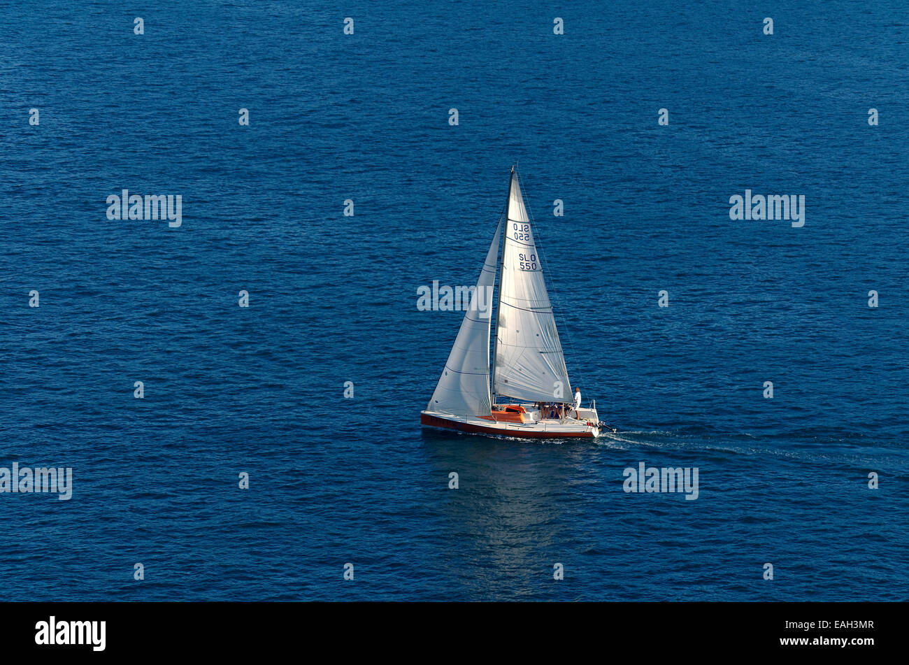 Sailing yacht cruiser/racer sailing close hauled. Stock Photo