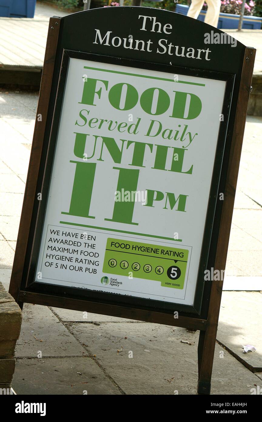 Food serving information sign and board outside the Wetherspoon's public house called The Mount Stuart in the city of Cardiff South Wales GB UK 2014 Stock Photo