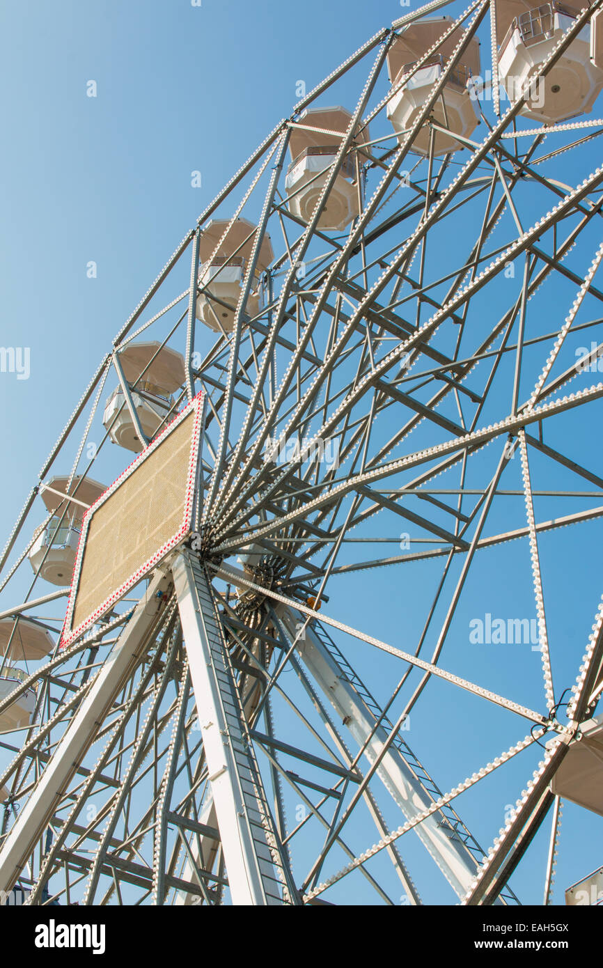 white ferris wheel against blue sky background Stock Photo - Alamy