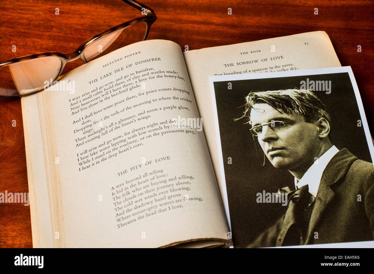 Photo of Irish poet W.B.Yeats with the text of his famous poem The Lake Isle of Innisfree Stock Photo