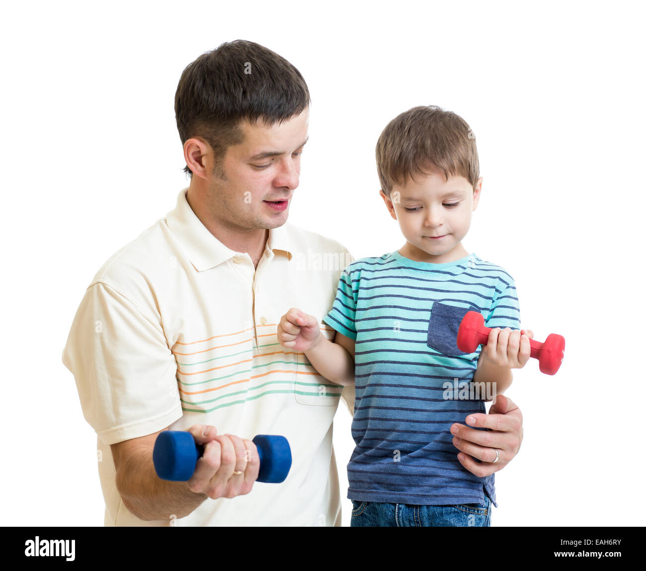 middle-aged man and kid do exercise with dumbbell Stock Photo