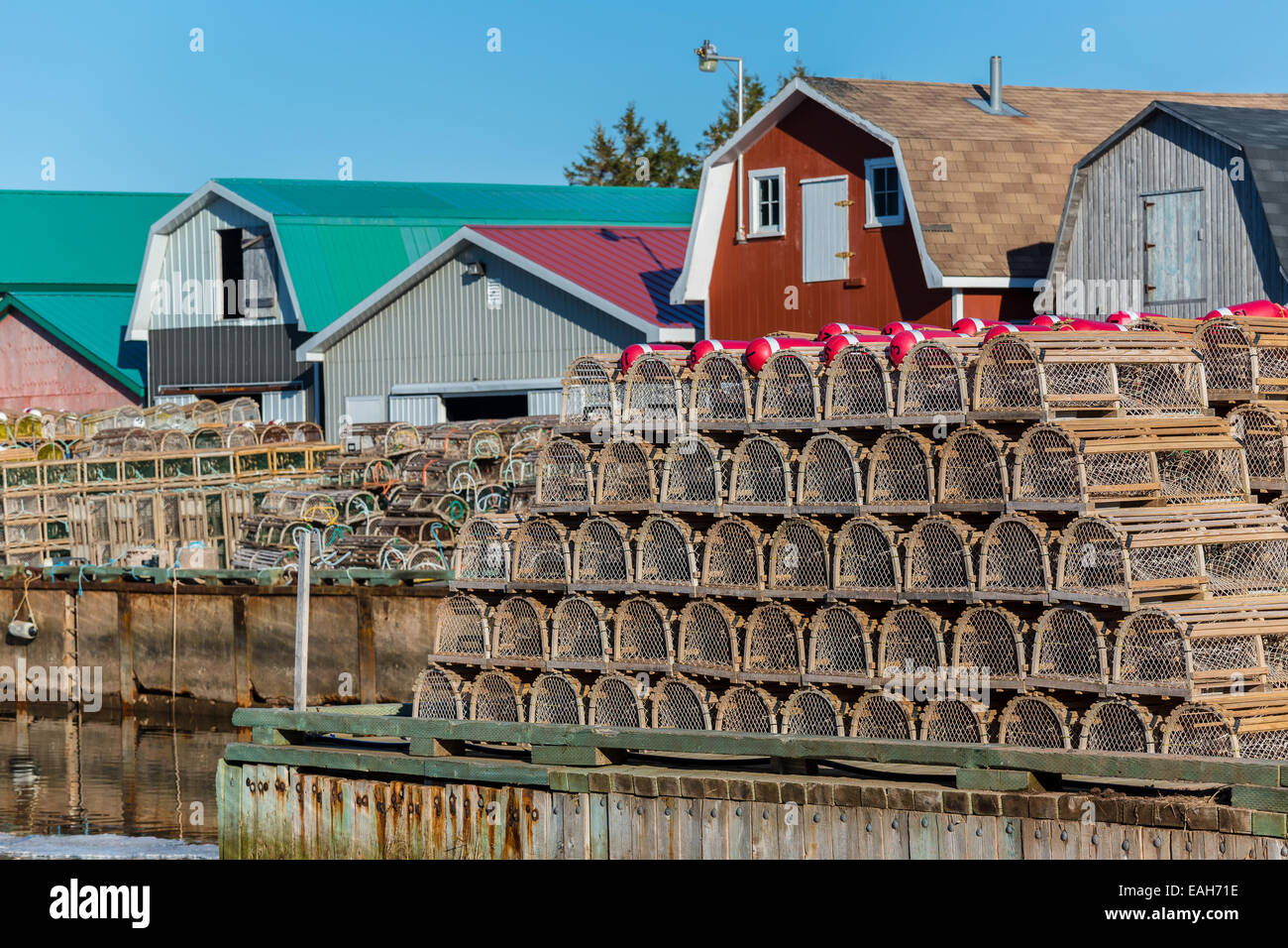 Piles of lobster traps on the wharf in rural Prince Edward Island