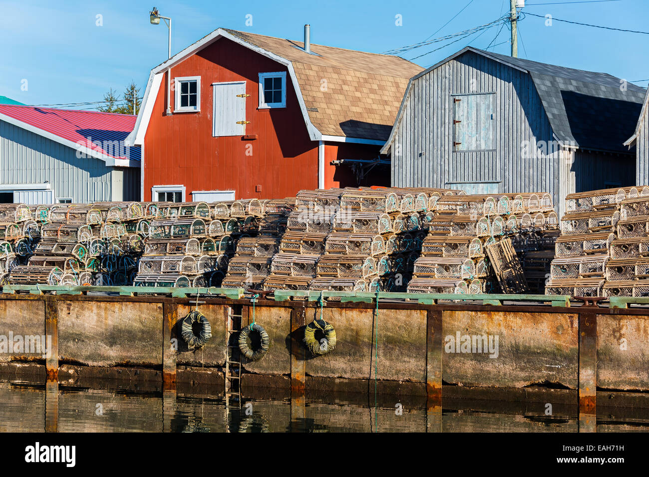Piles of lobster traps on the wharf in rural Prince Edward Island