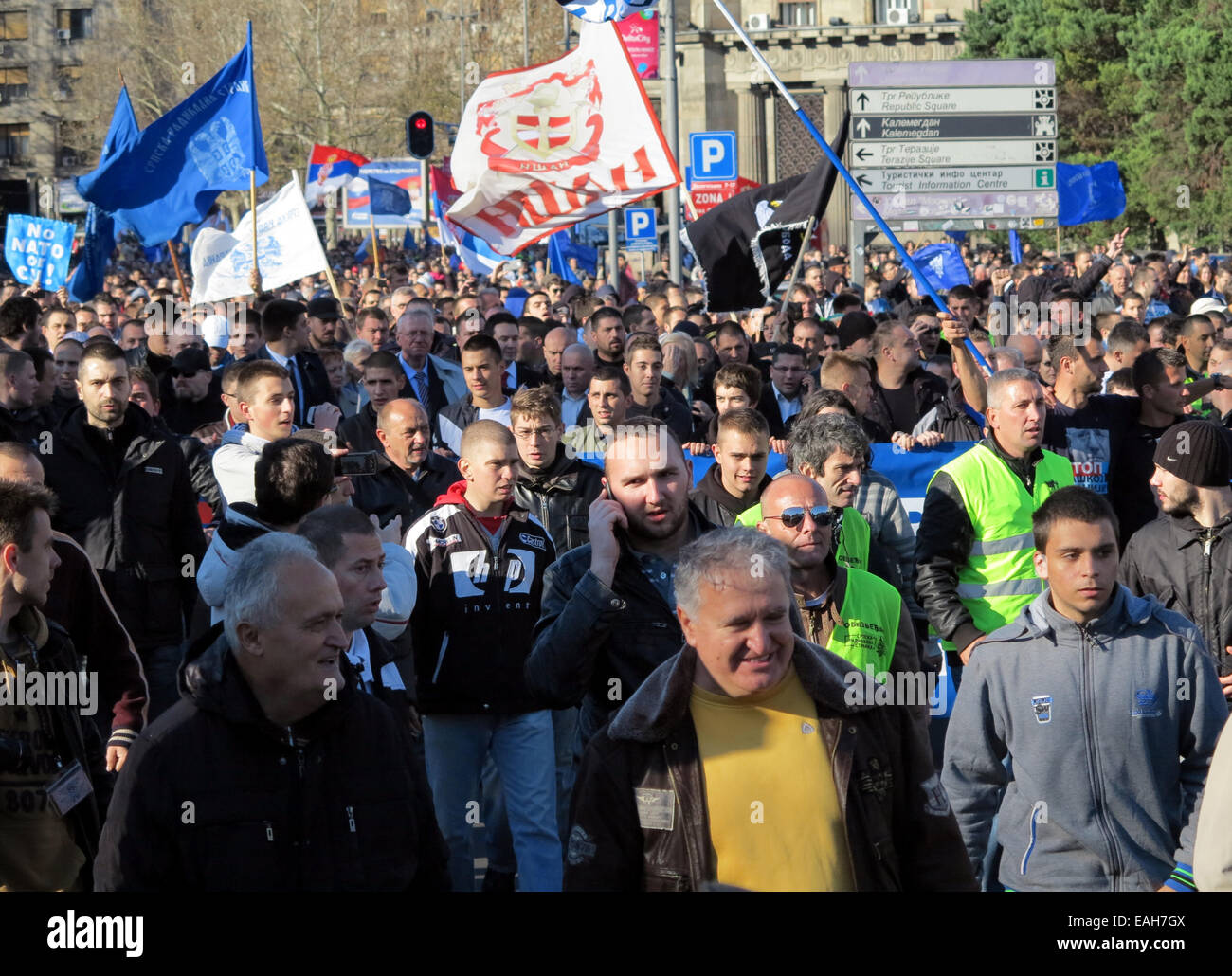 Belgrade, Serbia. 15th Nov, 2014. Thousands of nationalists, amongst them founder of the Serbian Radical Party Vojisalv Seselj (background, left, in light coat), take part in the 'victory march' through the center of Belgrade, Serbia, 15 November 2014. Photo: Thomas Brey/dpa/Alamy Live News Stock Photo