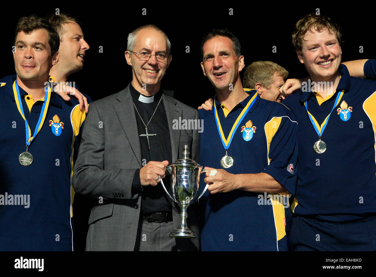 Cricket - The Most Reverend Justin Welby, Archbishop of Canterbury, with the victorious Archbishop XI team and a trophy Stock Photo