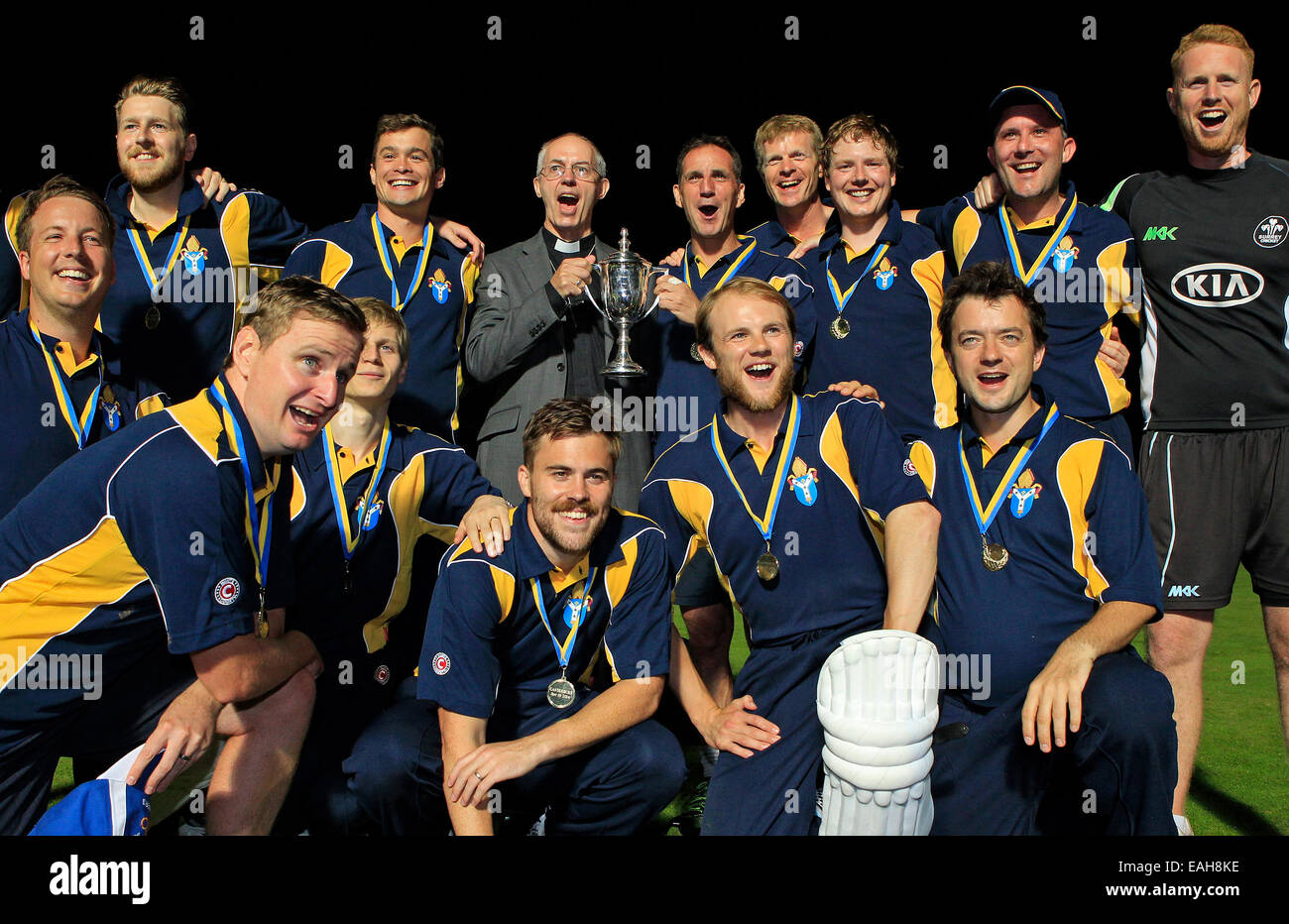 Cricket - The Most Reverend Justin Welby, Archbishop of Canterbury, with the victorious Archbishop XI team and a trophy Stock Photo