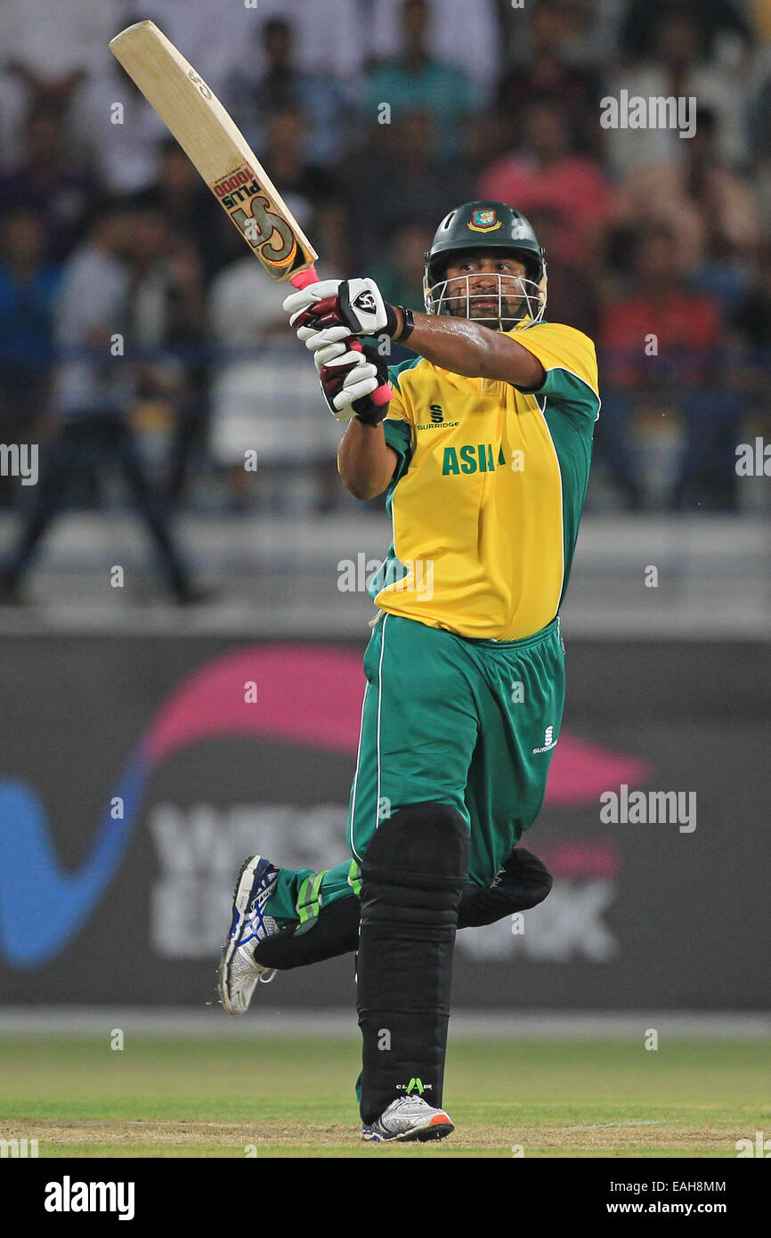 Cricket - Tamim Iqbal of the Asia XI bats during the match between a World XI & an Asia XI in Doha, Qatar Stock Photo