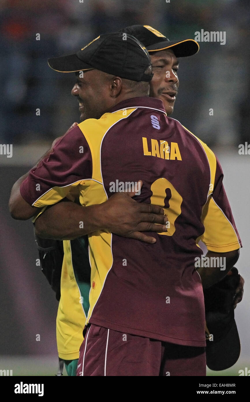 Cricket - West Indian cricketers Brian Lara & Gordon Greenidge embrace after the match between a World XI & an Asia XI in Doha Stock Photo