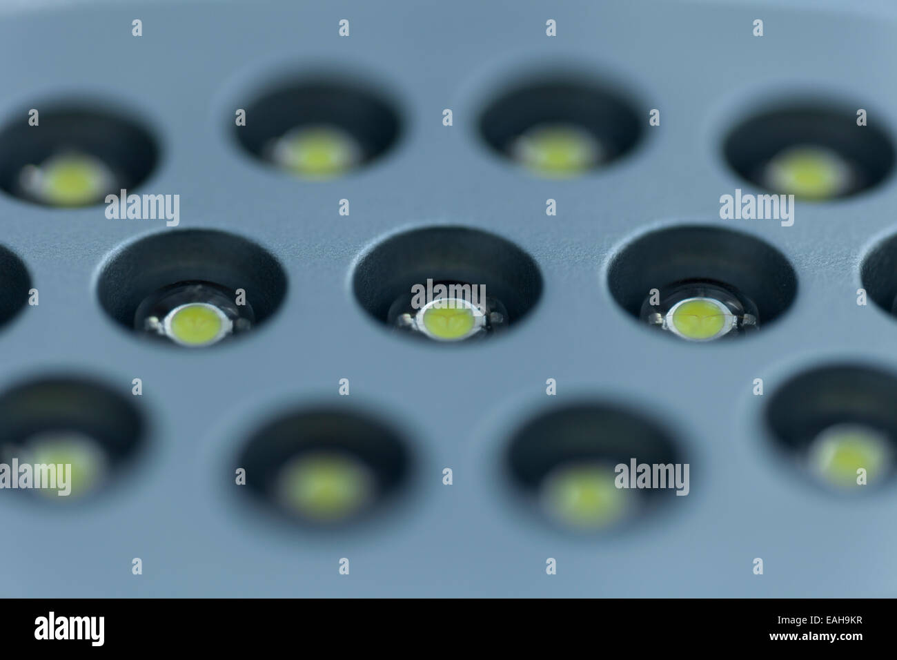 LEDs (SMD type) and their yellow phosphor covers in an LED desk lamp Stock Photo