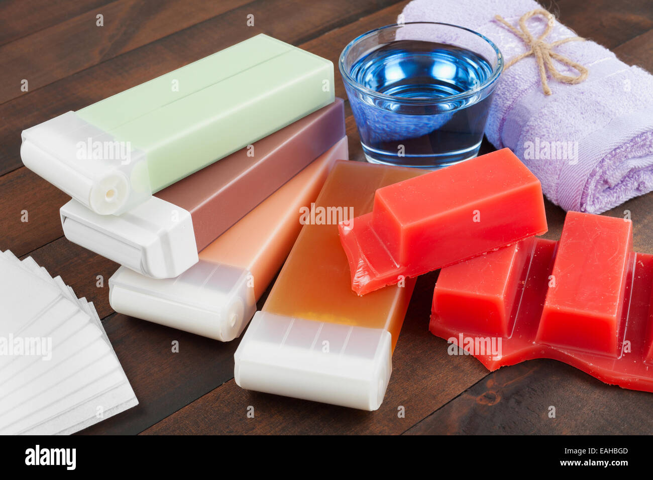 wax for hair removal, towel and oil Stock Photo