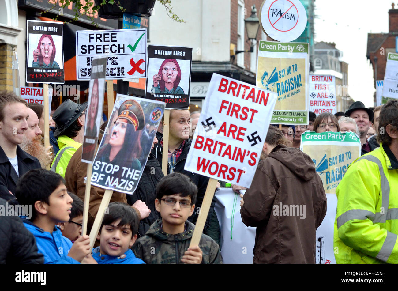Rochester, UK. 15th November, 2014. Approximately 25-30 Britain First supporters including Paul Golding and their Parliamentary Candidate Jayda Fransen march down Rochester High Street meeting many more counter protesters. Stock Photo