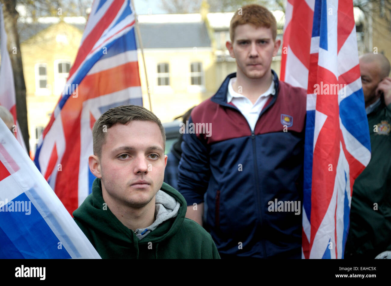 Rochester, UK. 15th November, 2014. Approximately 25-30 Britain First supporters including Paul Golding and their Parliamentary Candidate Jayda Fransen march down Rochester High Street meeting many more counter protesters. Stock Photo