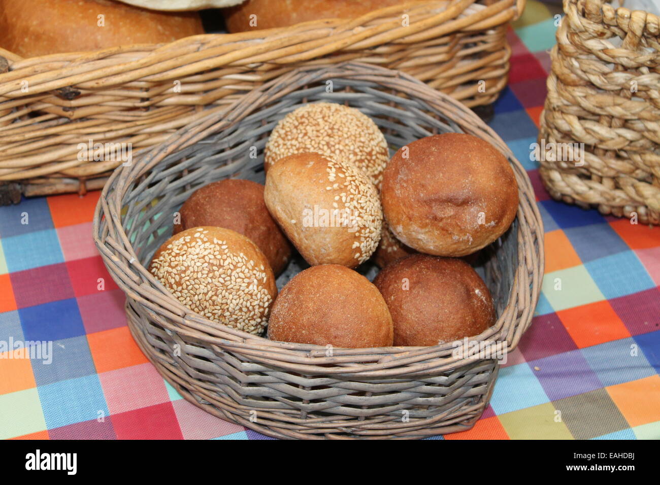 A Wicker Basket of Freshly Made Round Bread Rolls Stock Photo Alamy