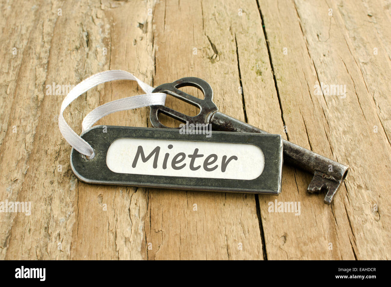 key and card with lettering tanant Stock Photo - Alamy