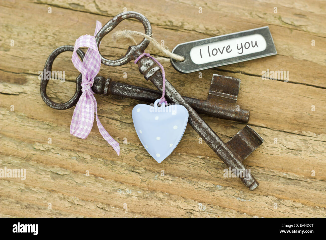 two keys, bow and heart Stock Photo - Alamy
