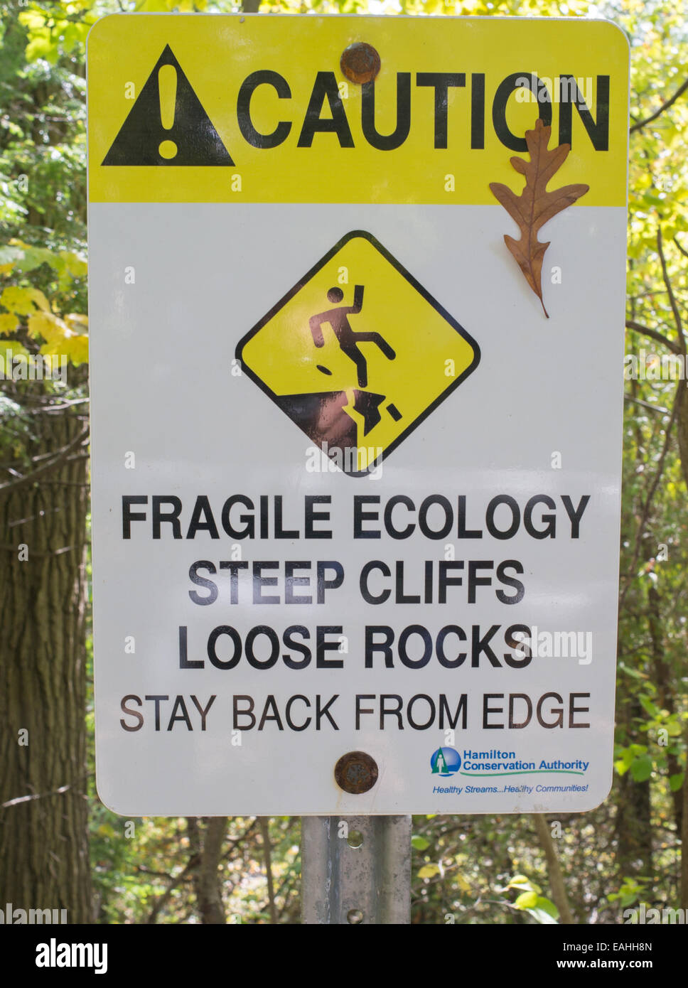 Sign caution fragile ecology steep cliffs loose rocks Spencer Gorge, Dundas, Hamilton, Ontario, Canada Stock Photo