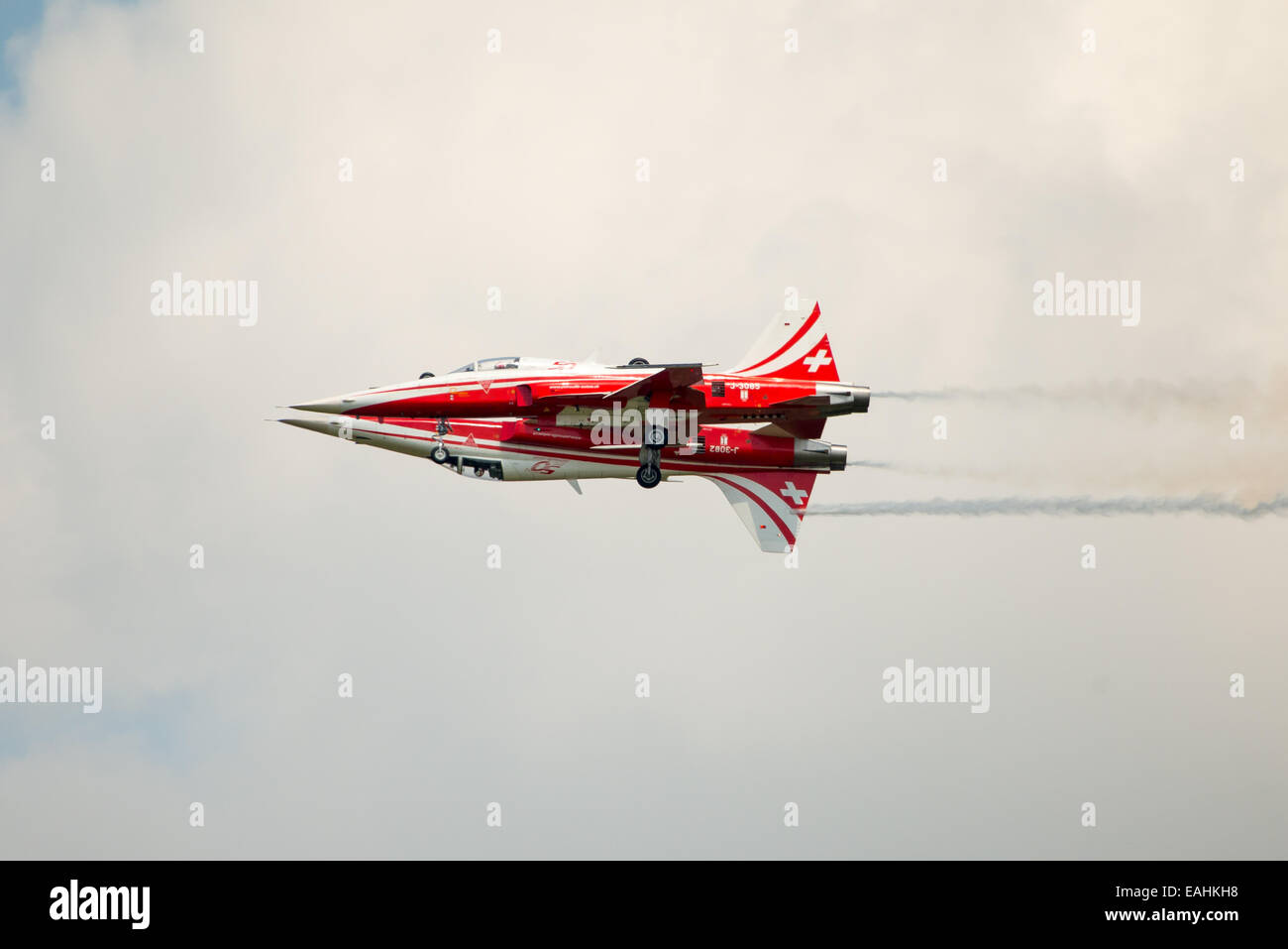 Fairford, UK - 12 July 2014: Patrouille Suisse F5 pair of aircraft displaying at the Royal International Air Tattoo. Stock Photo