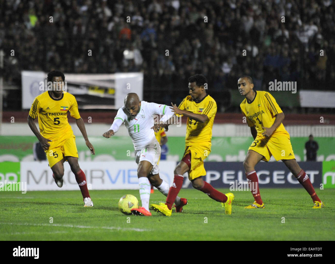 Algiers, Algeria. 16th Nov, 2014. Algeria's Yacine Brahimi (2nd, L) controls the ball during their qualifying match against Ethiopia of 2015 Africa Cup of Nations in Algiers, capital of Algeria, Nov. 15, 2014. Algeria won 3-1. Credit:  Xinhua/Alamy Live News Stock Photo