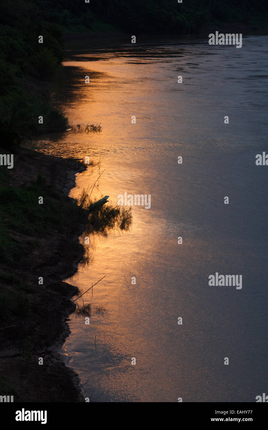 The banks of the Nam Ou river in Laos catching some golden light Stock Photo