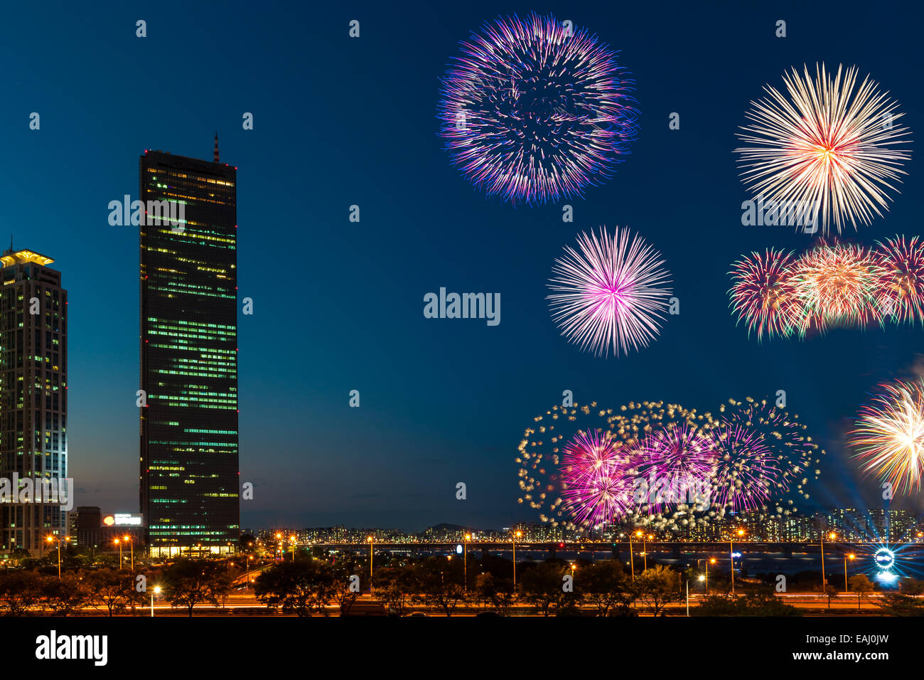 Fireworks explode over the Han River during the annual Seoul Fireworks Festival in Seoul, South Korea. Stock Photo