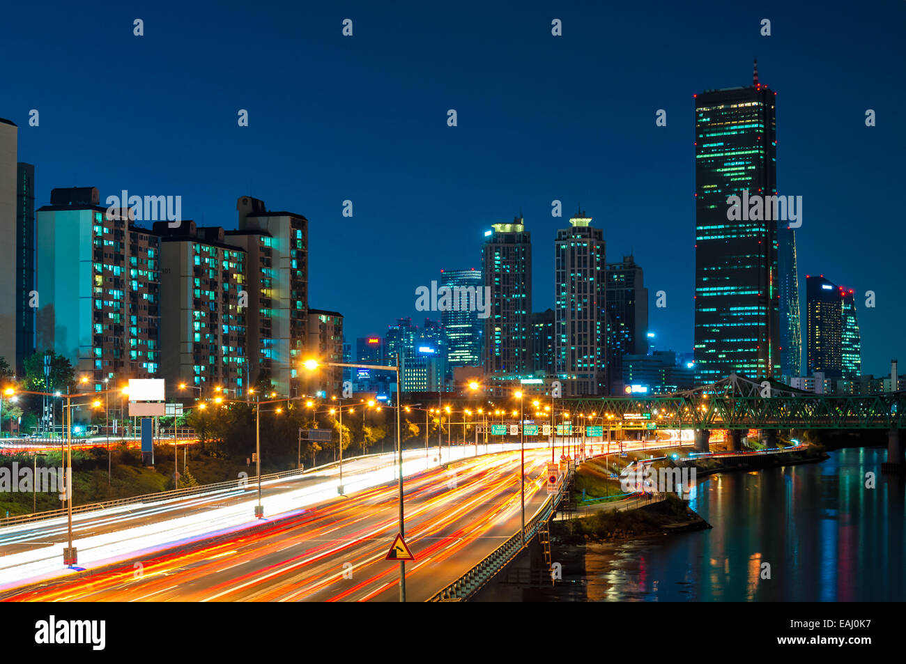 The lights of Seoul come up as night comes on. Stock Photo