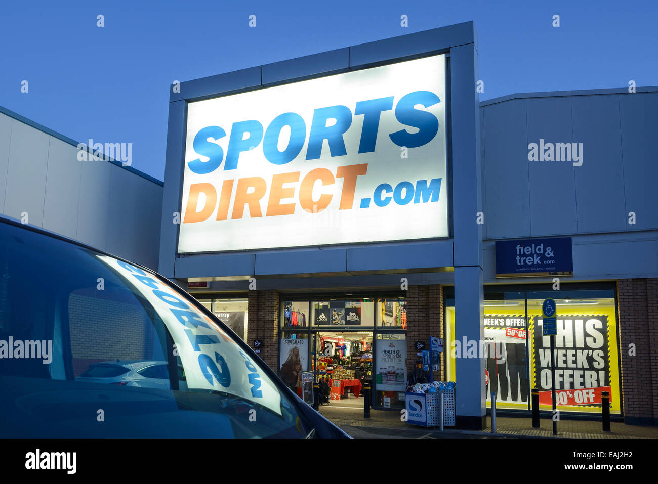 Sports Direct store entrance at night Stock Photo
