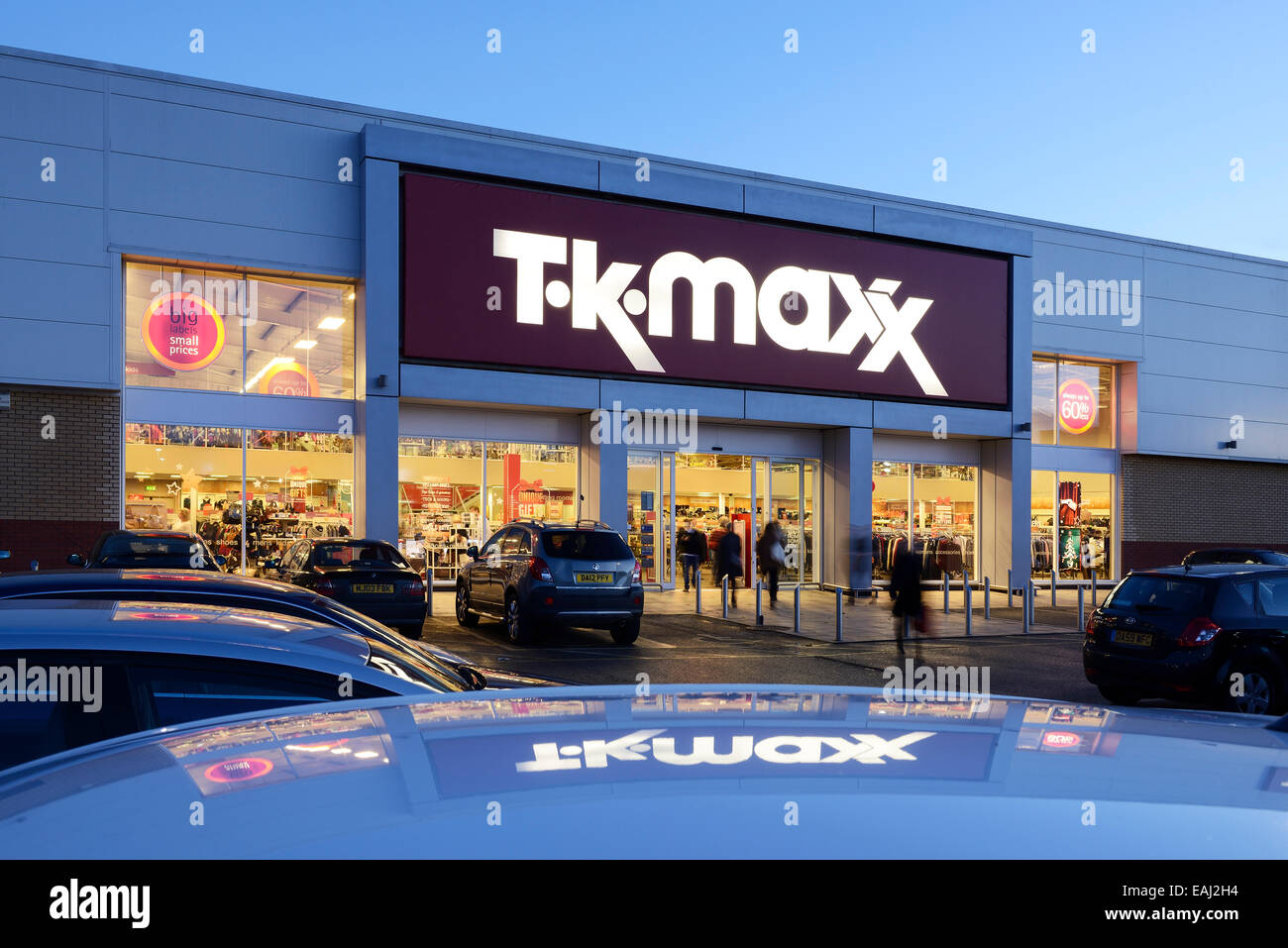 TK Maxx store entrance at night Stock Photo